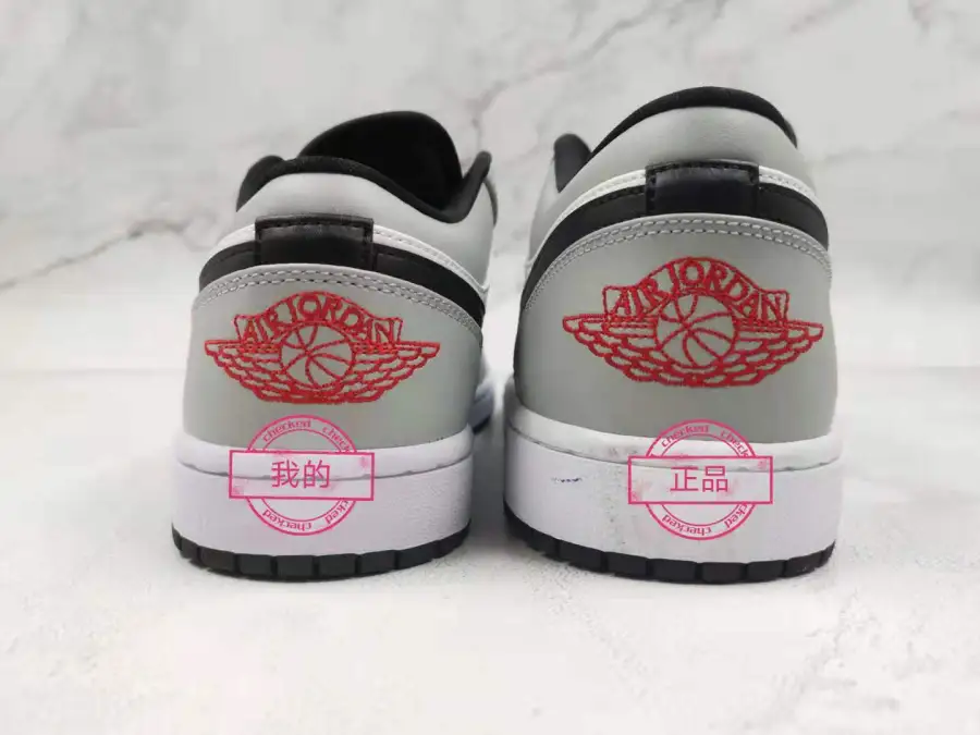 Jordan 1 Light Smoke Grey  Low